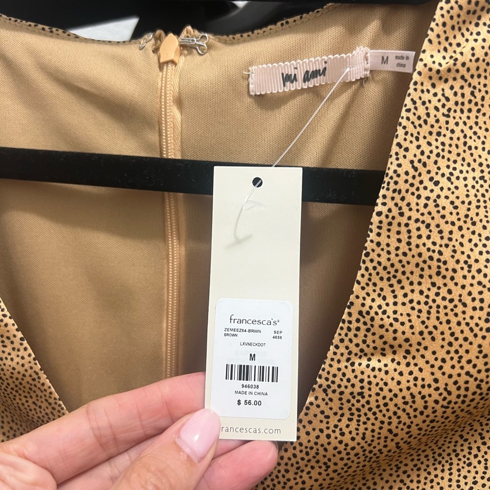 Francesca’s gold silk dress
